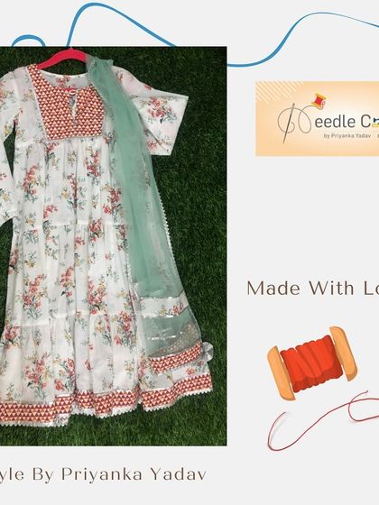 This white floral Anarkali suit with a contrasting mint green dupatta is a fresh and elegant choice. The delicate lace borders and detailed yoke make it a standout piece for any celebration.