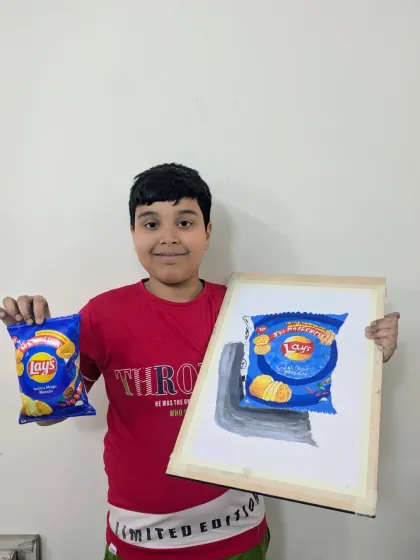 Art can be found in the most unexpected places. This student did a fantastic job with his watercolor study of a Lays packet, capturing the crinkles, colors, and branding with great detail.