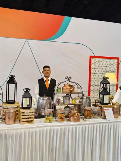 The dedicated tea and coffee station at the Air India X event. We ensure every detail is covered, including providing a well-stocked beverage and snack counter for guests to enjoy throughout the event.