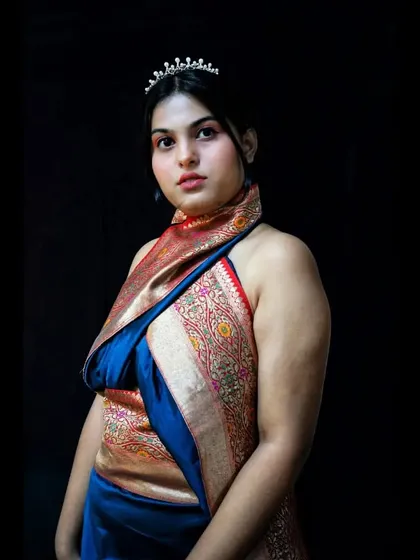 Let's get creative with your ethnic wear. I transformed a classic Banarasi saree into a modern, no-sew halter neck draped dress, accessorized with a simple tiara for a touch of fantasycore. This is how I approach fusion styling to create unique outfits.