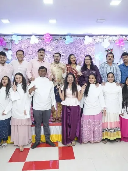 A group photo with the family after a successful and fun-filled baby shower. It's always a joy to see everyone come together and celebrate.