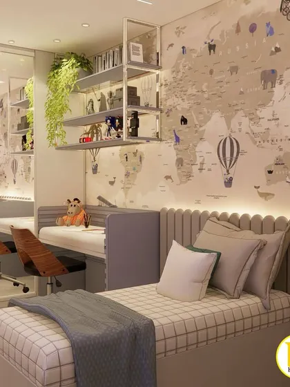 Another view of the travel-themed room, showing the bed with its scalloped headboard and the reflection in the mirrored wardrobe, which makes the room feel more spacious.