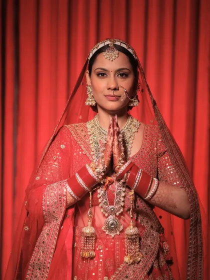 The classic red lehenga look is iconic for a reason. For this bride, I created a soft, elegant makeup style that felt both regal and personal. The focus was on clean, defined features and a radiant complexion that let her natural beauty shine through her traditional attire.