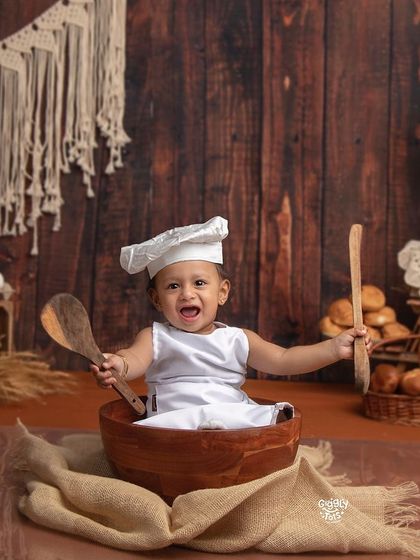 Turning two is so much fun! This little baker is ready to mix up some joy.