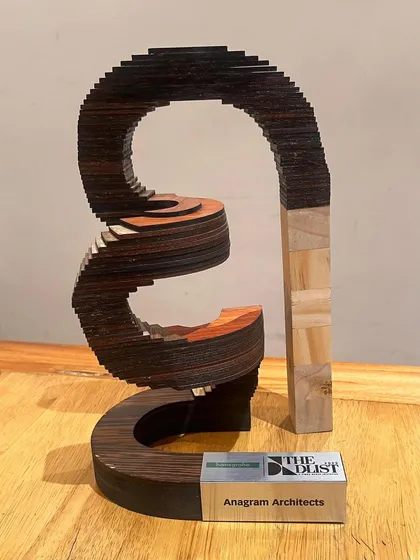 A close-up of the beautifully crafted trophy from the GoodHomes D-List, a symbol of the creativity and hard work recognized by the award.