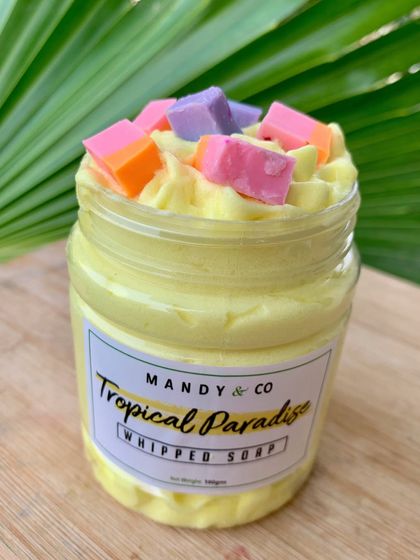 Your tropical vacation in a jar. My Tropical Paradise Whipped Soap is a fruity, exotic blend topped with colorful soap chunks that feels like a beach breeze.