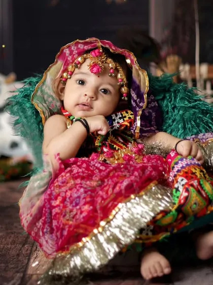 A little Radha in a beautiful, colorful outfit. Our Janmashtami themes are for little girls too!