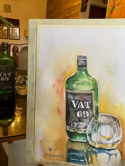 I grabbed a decade old bottle of Vat 69 from my Dad's collection for this still life. A watercolor sketch of the vintage green bottle and a glass, capturing the light and reflections.