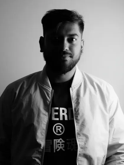 A portrait that captures the more focused, artistic side of my work. Behind every beat is a process of deep thought and creativity. This is the dedication I bring when I sit down to produce a new track or craft the perfect remix for a client.