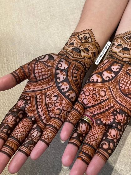 A different perspective of the elephant and lotus design, showing the clean and symmetrical application.