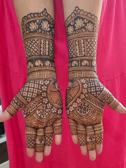 Elaborate Bridal Mehendi (Hands & Arms) photo 11