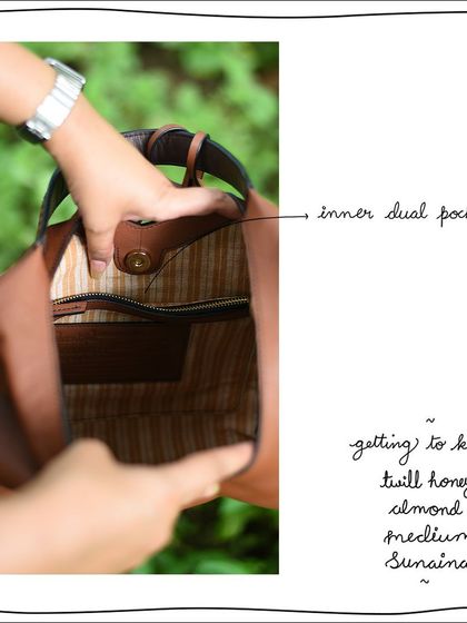 The inner dual pocket of the Twill Honey Almond Medium Sunaina. The striped cotton lining is a signature feature of our bags, adding a touch of brightness to the interior.