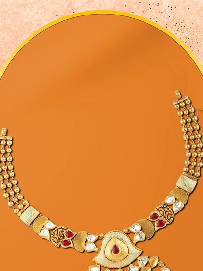 This choker necklace from our contemporary collection features a bold design with red stones and white enamel, perfect for the modern woman who loves to make a statement.