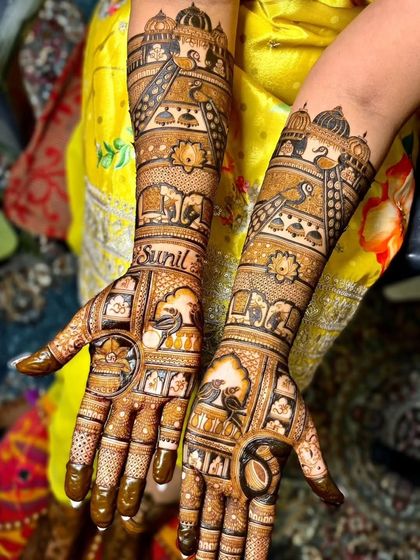 Another angle of the personalized mehandi for 'Sunil'. The design is filled with traditional motifs, creating a rich and meaningful look.