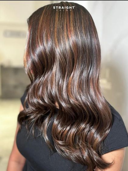A new hair color is a new chapter. This look features a beautiful blend of highlights and lowlights.