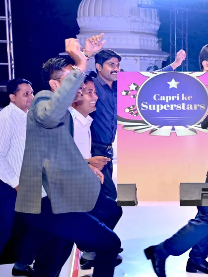 Employees celebrating their awards on stage at the "Capri ke Superstars" segment.