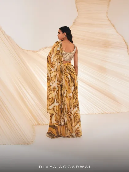 The back of the Verity co-ord set, showcasing the one-shoulder design and the full drape of the skirt.