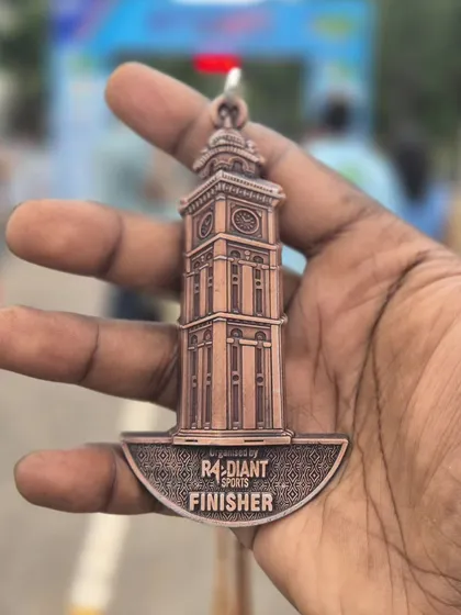 The finisher medal from the Mysuru Run, a tangible reward for enduring the pain and refusing to quit.
