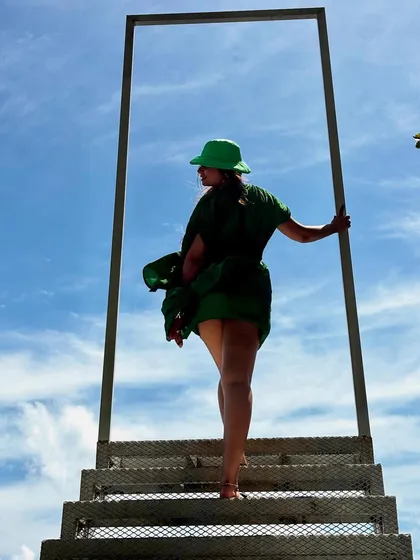 A dramatic shot on the 'stairway to heaven' installation at Secret Bay, with the wind catching my dress perfectly.