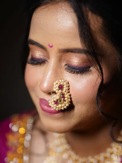 Another angle of the eye makeup, showing the seamless blend of colors that create a sophisticated yet understated look.