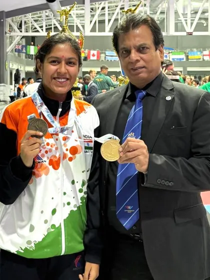 With Ms. Alisha, another of our bronze medal winners at the 21st AKF Asian Senior Karate Championship. We announced a cash award of ₹1,51,000 to honor her historic performance in the -55 kg Kumite category.
