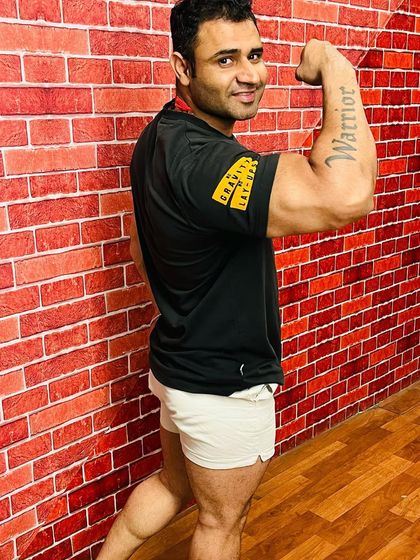 Showing off the results of consistent hard work. This is what my training methods can build.