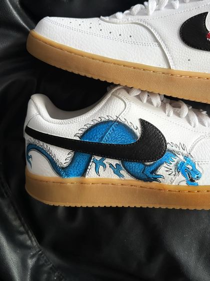 A close-up of the blue dragon artwork.