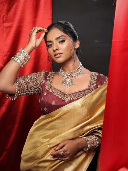 My philosophy is to celebrate every skin tone. This look is all about enhancing the beautiful, deep skin of the model with a flawless base, warm tones, and hazel eyes that tell a story. In my classes, you will learn to work confidently on all skin tones without ever changing them.