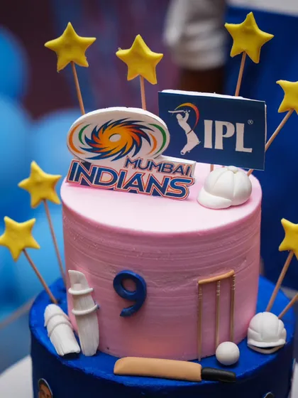 A close-up of the Mumbai Indians IPL-themed cake, perfect for a young cricket enthusiast.