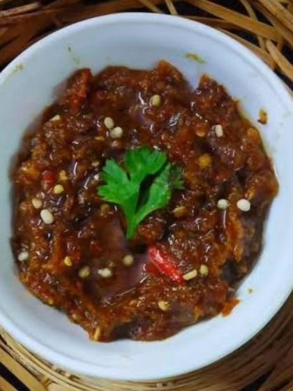 Our famous King Chilli Chutney, also known as Bhut Jolokia chutney. It's extremely spicy and adds a powerful kick to any meal. A must-try for spice lovers.