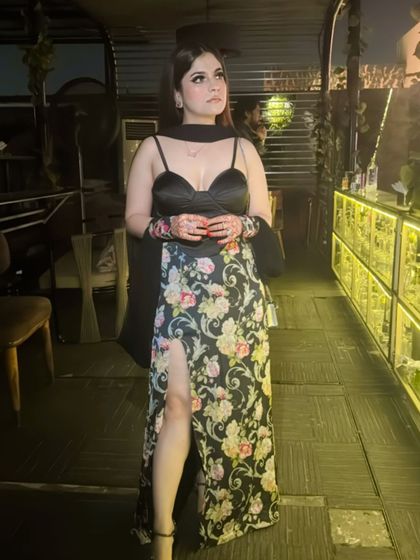 Another look at my custom black floral gown. The combination of the solid black bustier and the printed skirt creates a look that is both classic and modern.