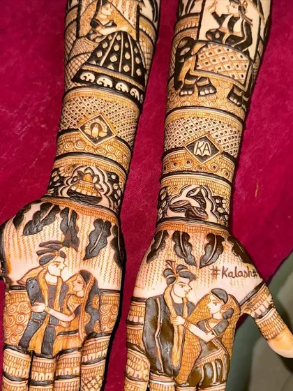 A full bridal design featuring multiple figures and scenes, including a couple portrait and a royal procession with elephants.