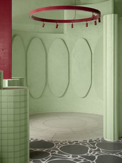 The flooring in this zone features a circular inlay, demonstrating our ability to create complex, integrated patterns within our terrazzo surfaces.