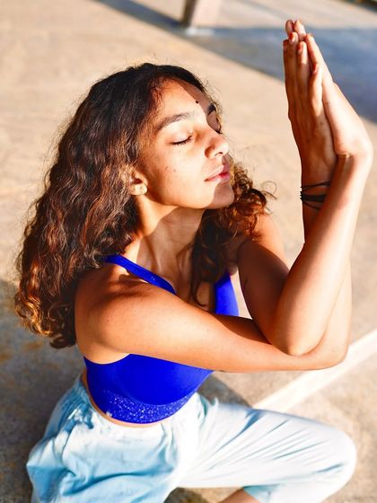 In Garudasana arms, I embody the feeling of being a thread in a single tapestry. We are all different notes in the same melody, walking each other home.