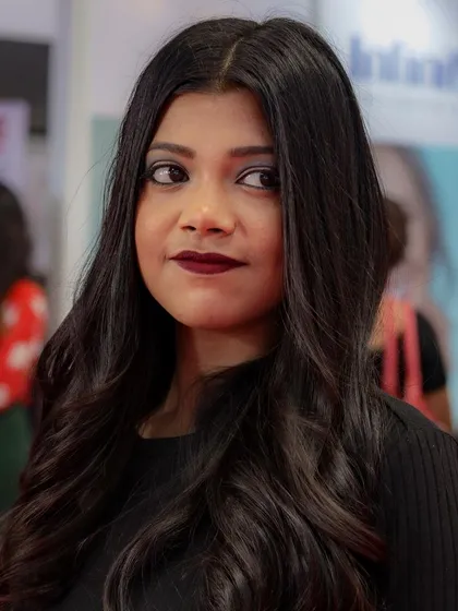 Learning to create looks that are both beautiful in person and striking on camera is a key part of our training.