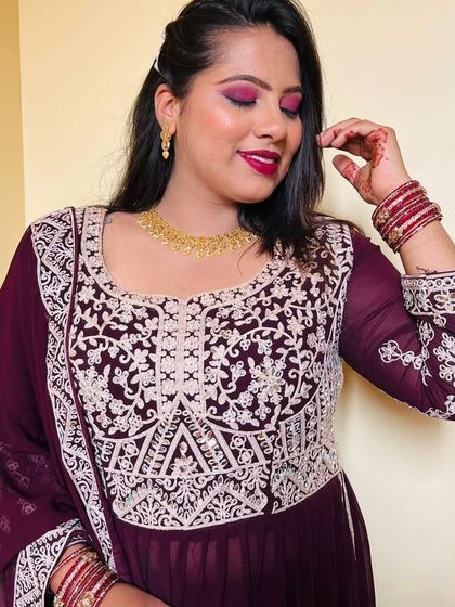 A beautiful close-up of the party makeup, with a focus on the dramatic eyes and flawless skin.