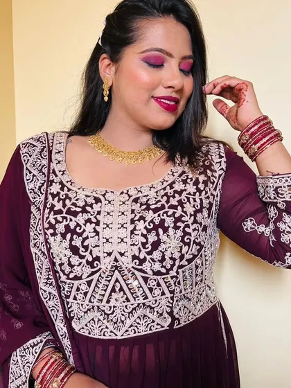 A beautiful close-up of the party makeup, with a focus on the dramatic eyes and flawless skin.