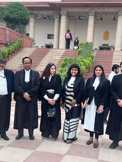 My team and I outside the Supreme Court. We stand united in our mission to provide the best legal representation.
