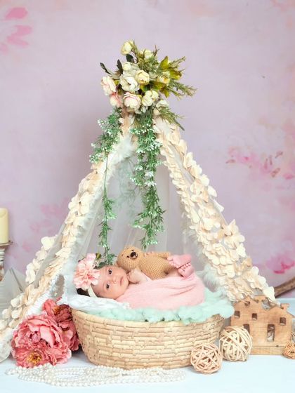 Another look at my floral teepee theme, showing how I create a complete, picturesque scene for your newborn's first photoshoot.