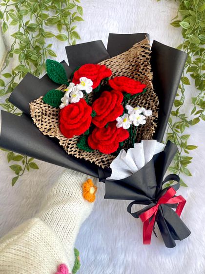 A fun, candid shot showing the red rose bouquet. It’s a beautiful arrangement that I was so happy to make for two different customers in one week.