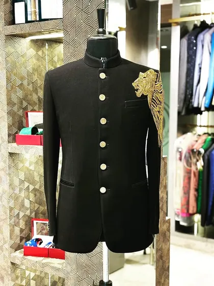 For those who want to make a bold statement, I create pieces like this. A classic black bandhgala elevated with a powerful, hand-embroidered tiger motif on the shoulder, crafted from rich fabric for a luxurious feel.