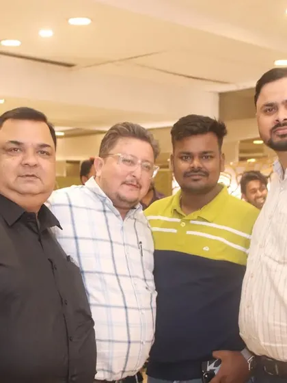 A group of male guests posing for a photo at a large event. I make sure to get plenty of group shots of friends and colleagues.