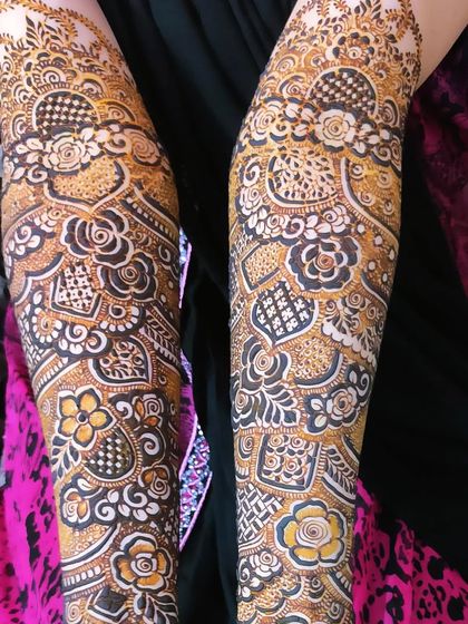 This design uses negative space to create a striking contrast, making the floral and geometric patterns stand out.