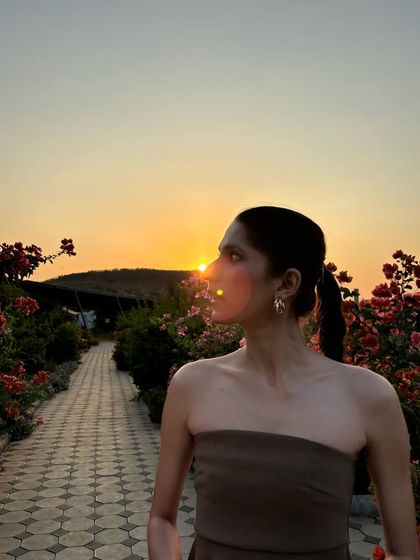 A golden hour moment in a simple brown tube top. The focus here is on the silhouette and the beautiful light.