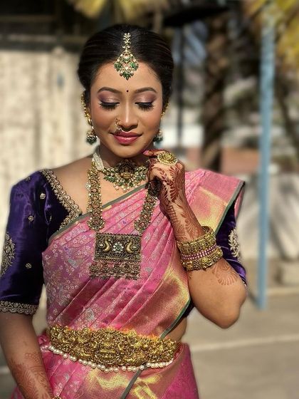 A beautiful sun-kissed shot of this bride, the natural light making her makeup glow.