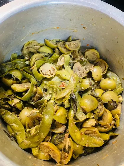 Bitter eggplant cooked with bamboo shoot, flat beans, and dried fish.