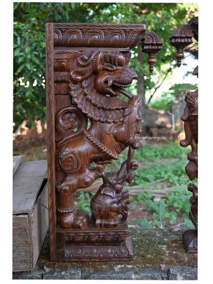 The Yaali bracket seen from a slightly different perspective, highlighting the depth of the relief and the richness of the wax brown finish.