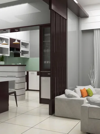 An open-concept living and dining area separated by a stylish wooden partition. This design maintains an airy feel while clearly defining the different functional zones of the home.