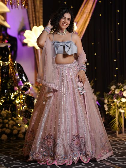 A happy, twirling moment in my wedding guest lehenga. This photo captures the joy and celebratory spirit of an Indian wedding, showing the outfit in motion.