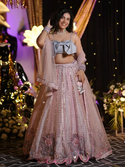 A full view of this dreamy pastel lehenga. Notice how the intricate embroidery and sequin work catch the light. I focus on finding pieces with beautiful details that make you feel like you’re wearing a work of art.
